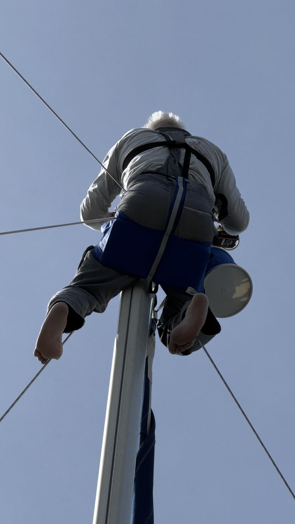 Hanging at the end of the mast